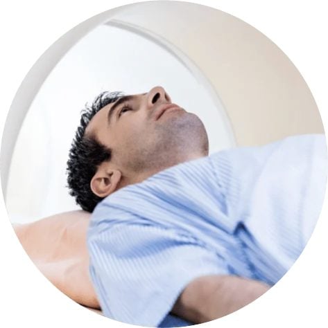 Man going into an MRI machine